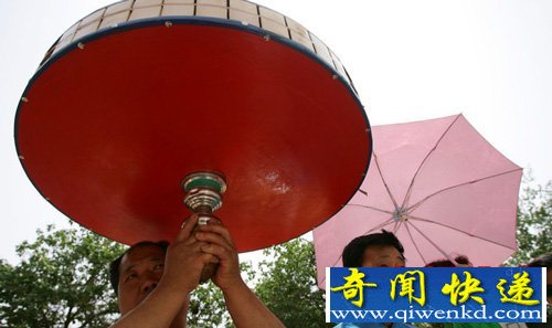 夏季高温逼人 揭秘各地防晒奇葩绝技