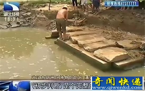 武汉洪水冲出千年古墓 墓主或为北宋千年女尸?