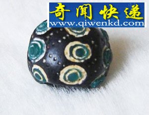 汉墓里发现罕见“蜻蜓眼”